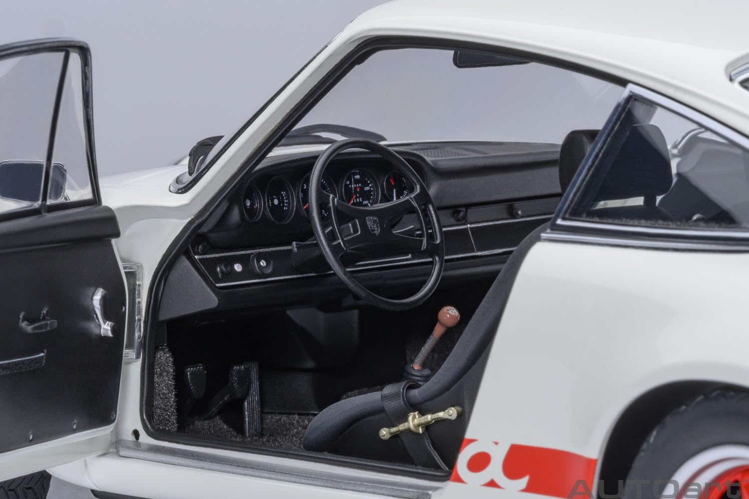 Autoart 1/18 Porsche 911 Carrera 2.7 RS Model in Grand Prix White with Red Stripes