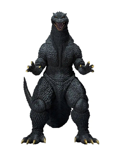 A detailed action figure of Godzilla, standing upright with arms raised and mouth open, showcasing its textured skin and sharp claws.
